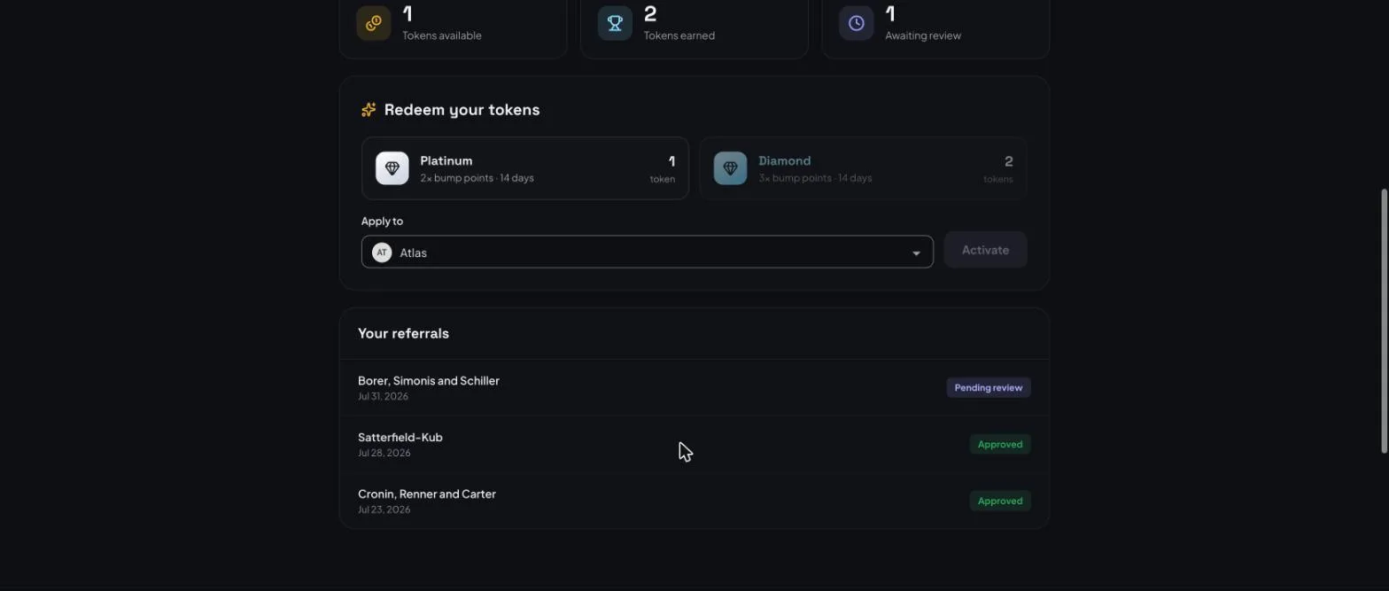 The redeem section showing Platinum for one token and Diamond for two, a listing selector, and a referral history list with approved and pending entries